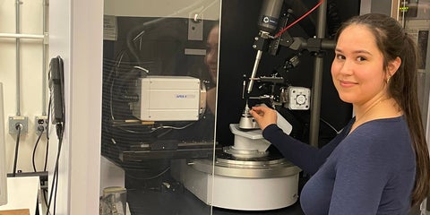 Graduate student is operating the Kappa Bruker diffractometer