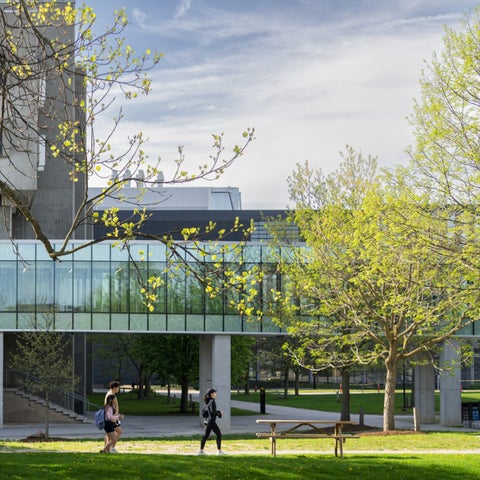 Waterloo students walking in front of Math building tunnel across from the Student Life Centre