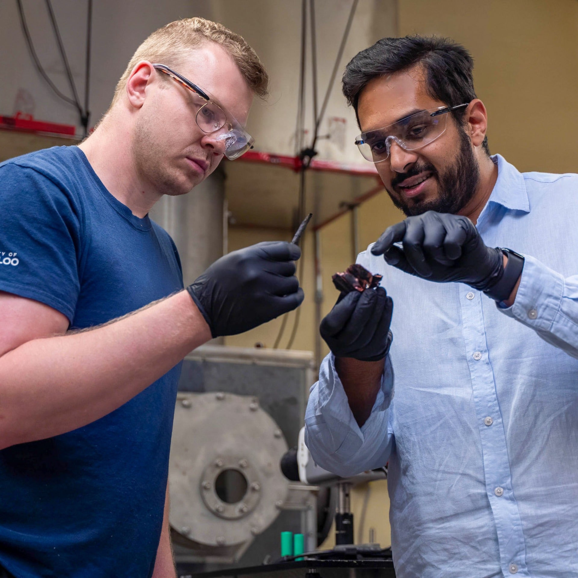 Dr. Vinny Gupta and Braden in lab expecting materials 