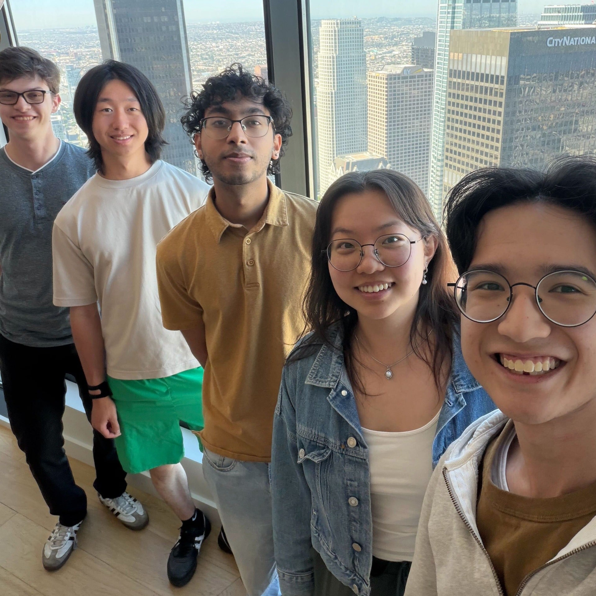 Waterloo students smling at the famera