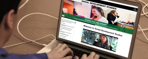 Student using the Social Development Studies website