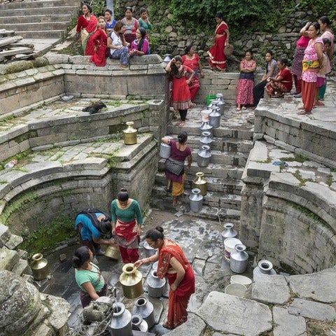 "Queuing for Water" by Joe B N Leung. Women wait in long lines for water in a village near the Changu Narayan Temple, north of B