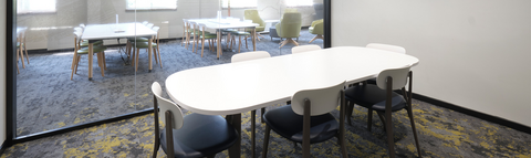 a study room in the library with table and chairs