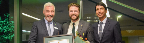 Andrew James Zettel receiving his award from Peter Meehan and Bruce Rodrigues