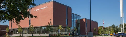 St. Jerome's University Atrium entrance in front of a blue sky