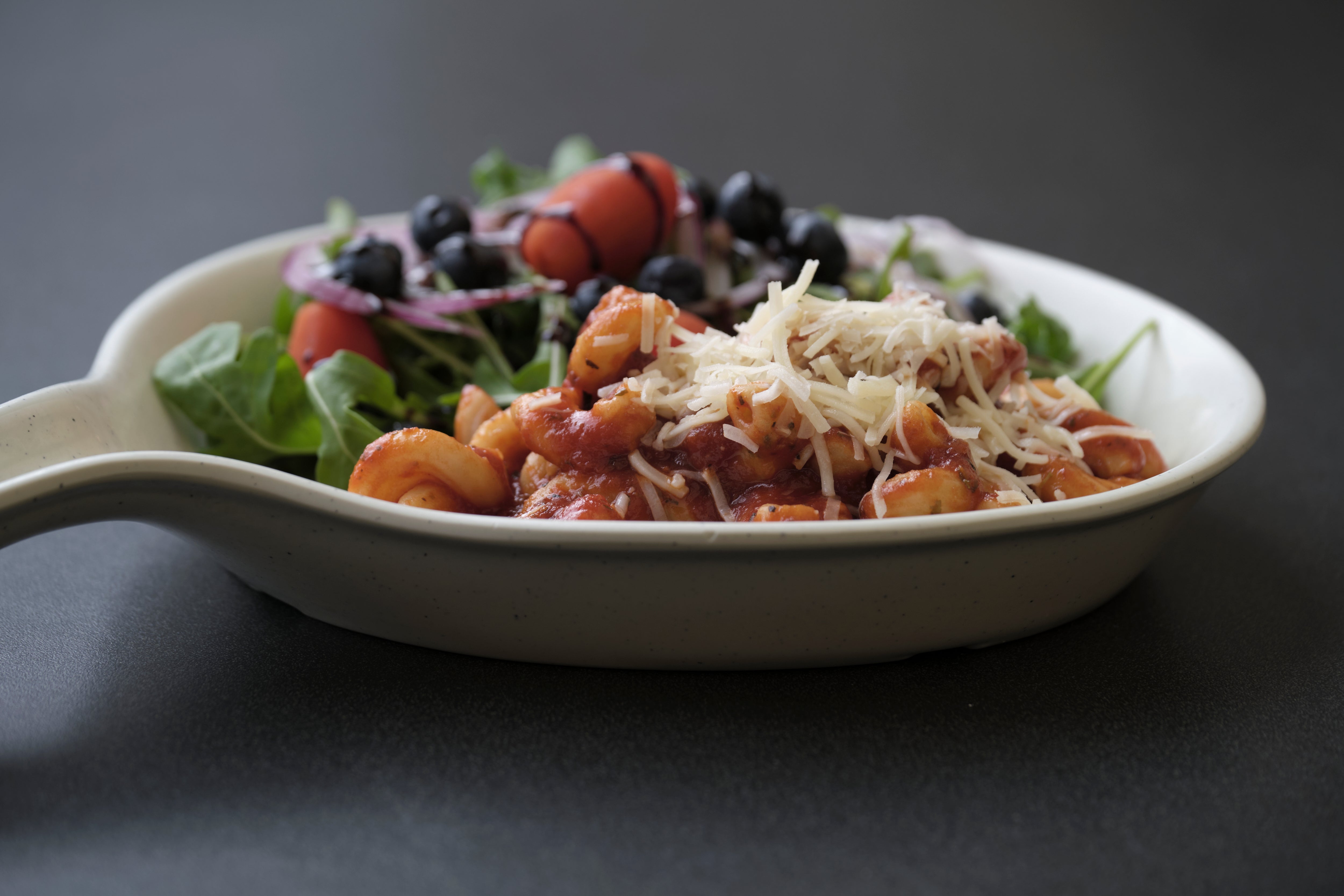 Plate of pasta and berry salad