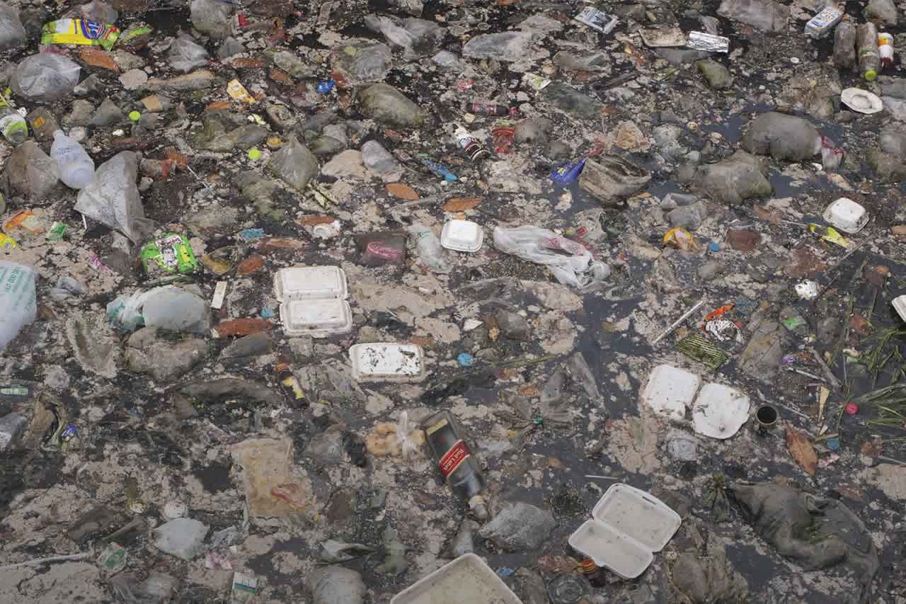 garbage floating in water