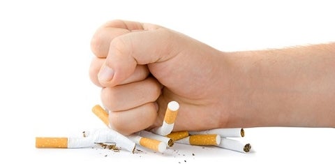 fist crushing cigarettes