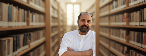 Ali Ghodsi in a library