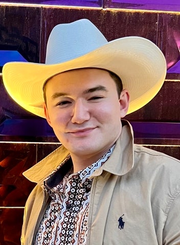 Austin wearing a cowboy hat