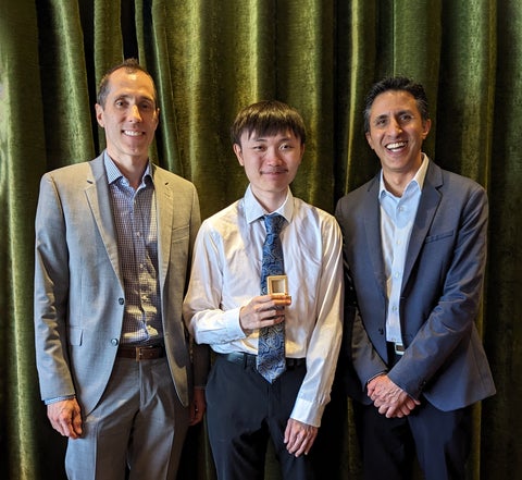 Richard (Eckler Ltd.), Hugo Quach (UW), and Tulio (Eckler Ltd.) pose for presentation of the Eckler Award.