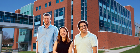 Martin Lysy, Meixi Chen, and Reza Ramezan stand in front of an M3 backdrop
