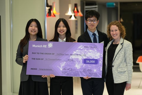 Joanna Li, Adrian Lock, and Michelle Ng, and faculty advisor Emily Kozlowski posing with winning cheque