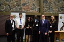 Recipients of Tom Dabrowski Impact Award receive plaques in Alumni Hall