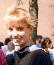 Andrea Fraser wearing graduation gown