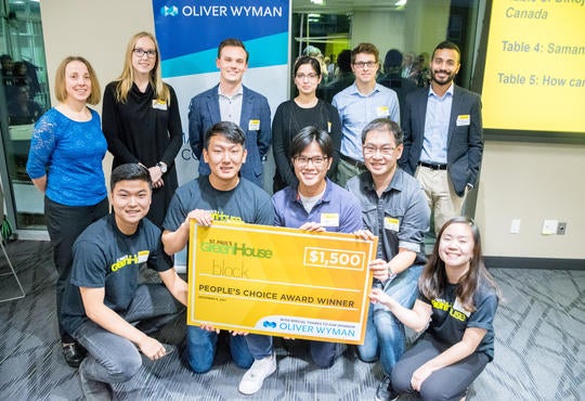 Team members of social venture Block pose with People's Choice Award cheque for $1,500