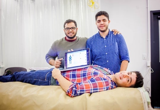 The Curiato team pose with their smart mattress prototype