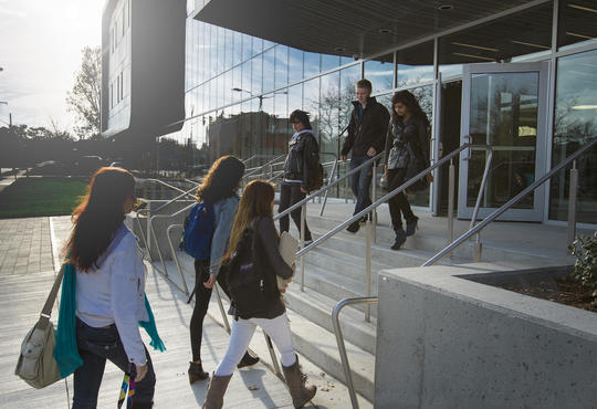 students at the entrance of Stratford campus
