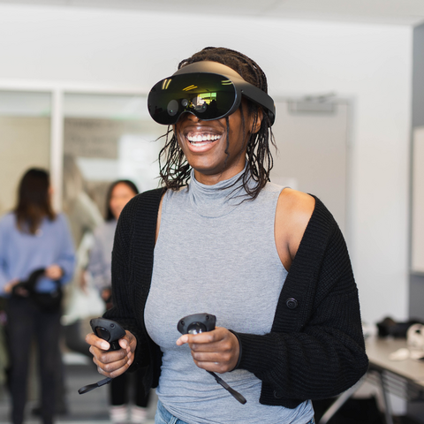 Student using a Meta Quest Pro VR headset