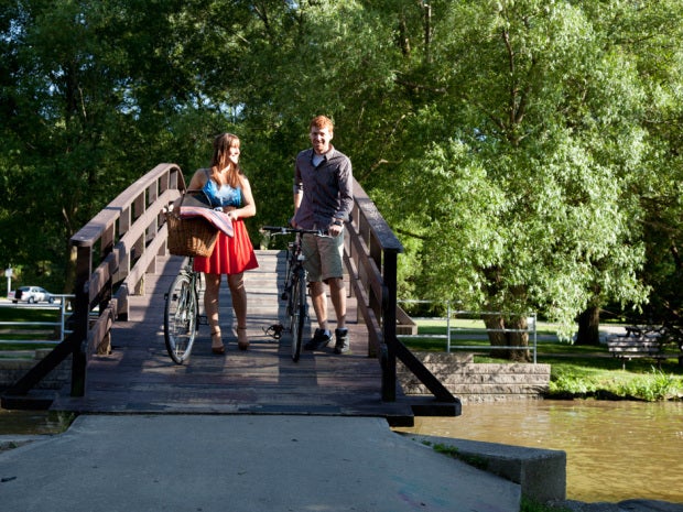 Cyclists on a bridge in Stratford, Ontario.