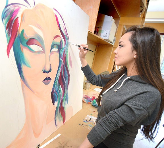 Stratford Central art student Tatianna Desak works on a year-end project for the class's upcoming exhibit 