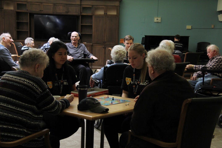 People playing a board game together