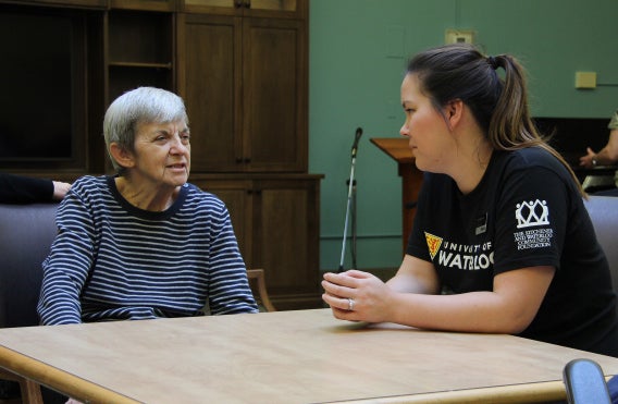 Two women chatting together