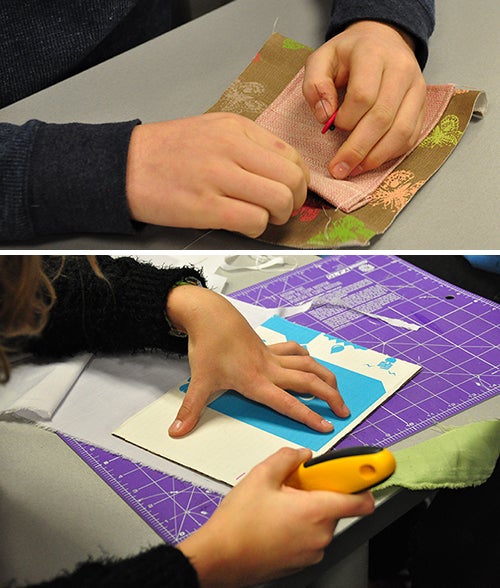 Junior Achievement students working on a sewing project.