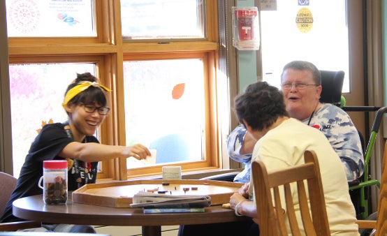 Three people playing a game