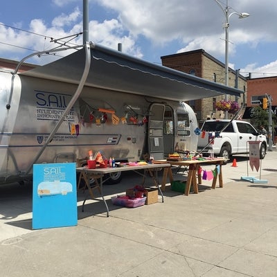Airstream trailer at Open Streets with flag making