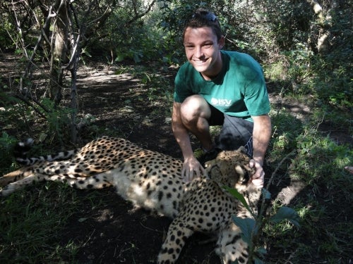 Kevin with a cheetah.
