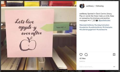 A screenshot fomr the University of Waterloo Library's Instagram accound of Andy Cho's Sticky that says &quot;lET's live  Apple-y ever after