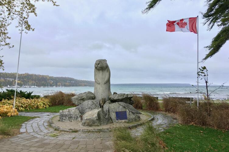 A very windy day at Lake Huron by the statue of Wiarton Willie.