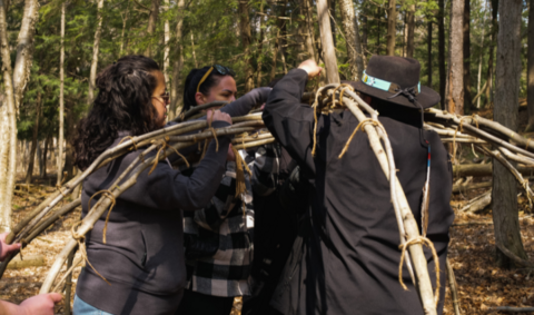 Indigenous students participating in a sweat ceremony