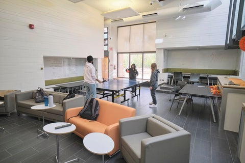 Students walking outside Village 1