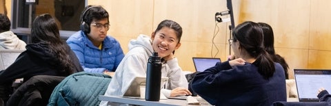 Girl smiling at her friends