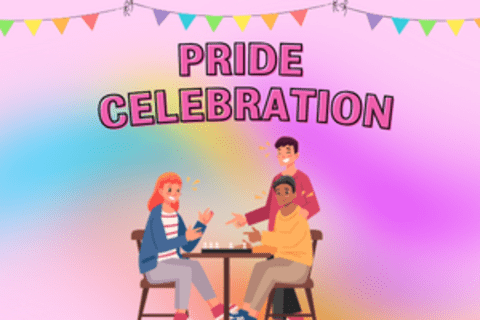 Friends playing a board game at pride event
