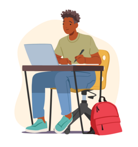 A student sitting at a desk with their laptop open while they write on a paper placed on the desk. He has a red backpack leaned against the table on the floor.