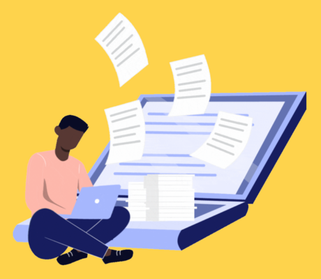 Someone sitting down with a laptop open in their lap, there is a few papers flying around everywhere.