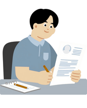 Man sitting at a desk and writing on a piece of paper