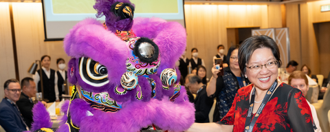 Lady smiling at an event