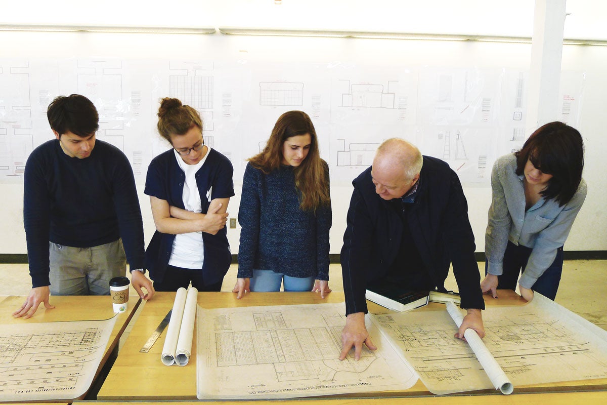 Robert Jan van Pelt and his team of Anne Bordeleau, Donald McKay, Sascha Hastings and Waterloo architecture students examine blueprints