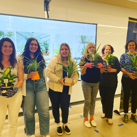 Green Office employees at plant workshop
