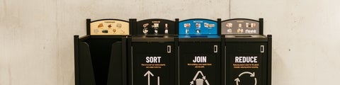 Closeup of four stream waste bins