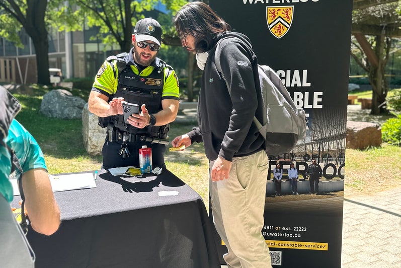 Person registering their bike with special constable