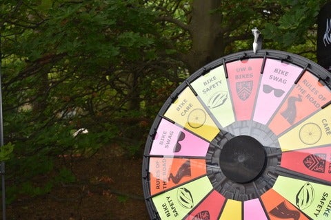 Spin-the-wheel activity with cycling-related prizes