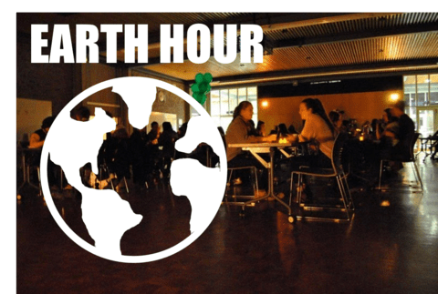 Students celebrating earth hour by candlelight