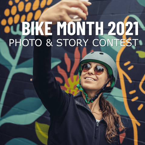 Woman in helmet taking a selfie in front of a wall mural; text overlaid that reads Bike Month 2021: Photo and Story Contest