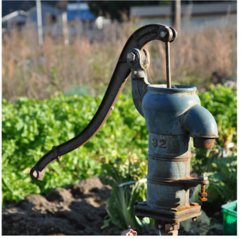Water pump in a field.