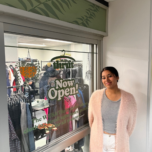 Student in front of WUSA Thrift